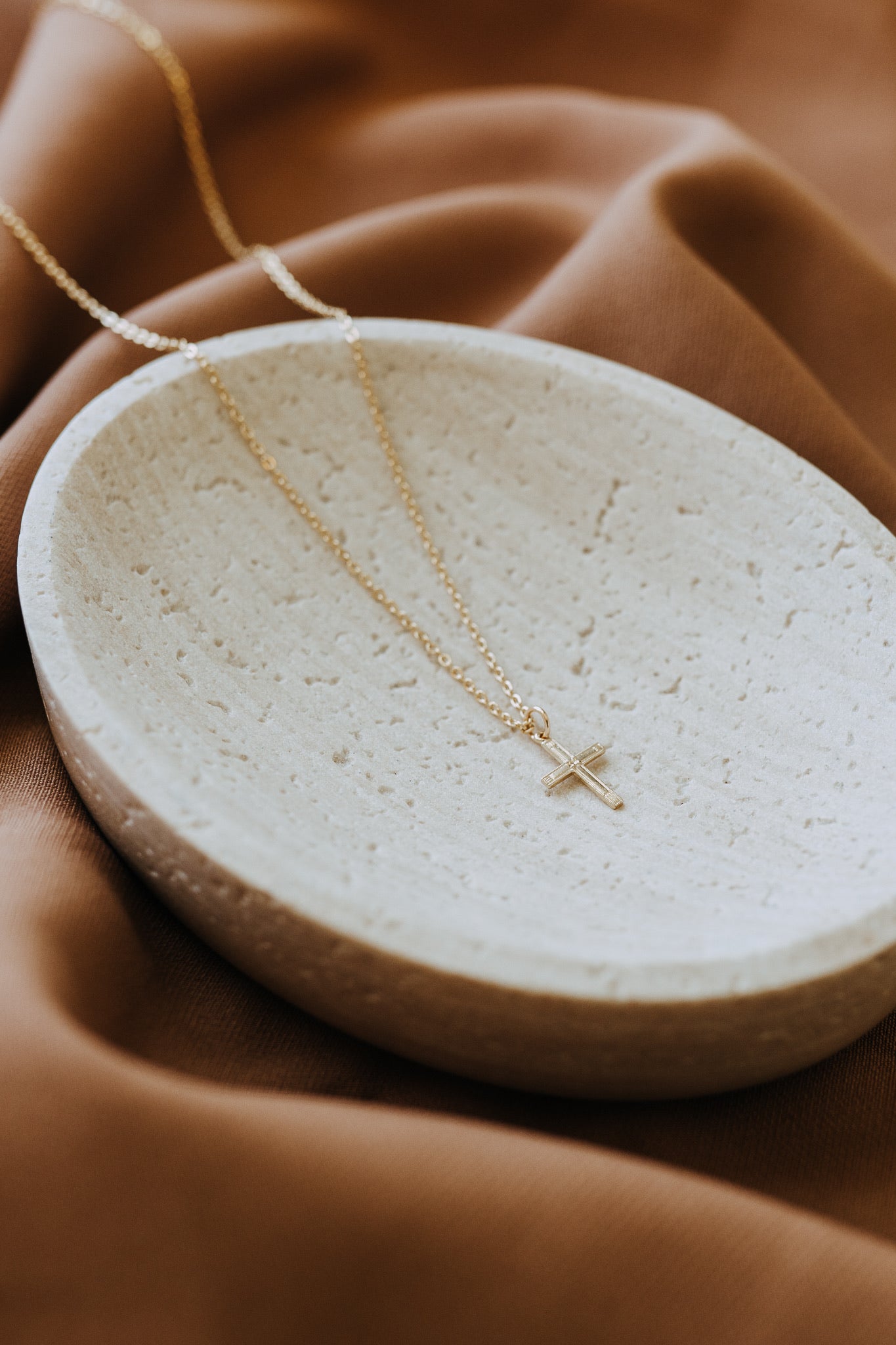 Dainty cross necklace designed for everyday jewelry layering