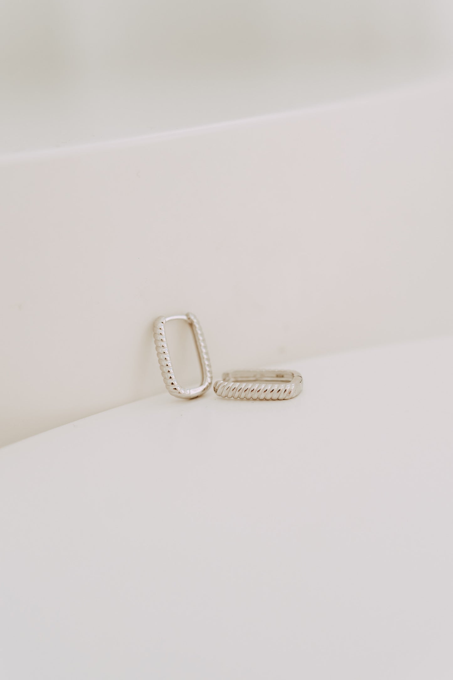 Lux - Silver Twist Huggie Hoops