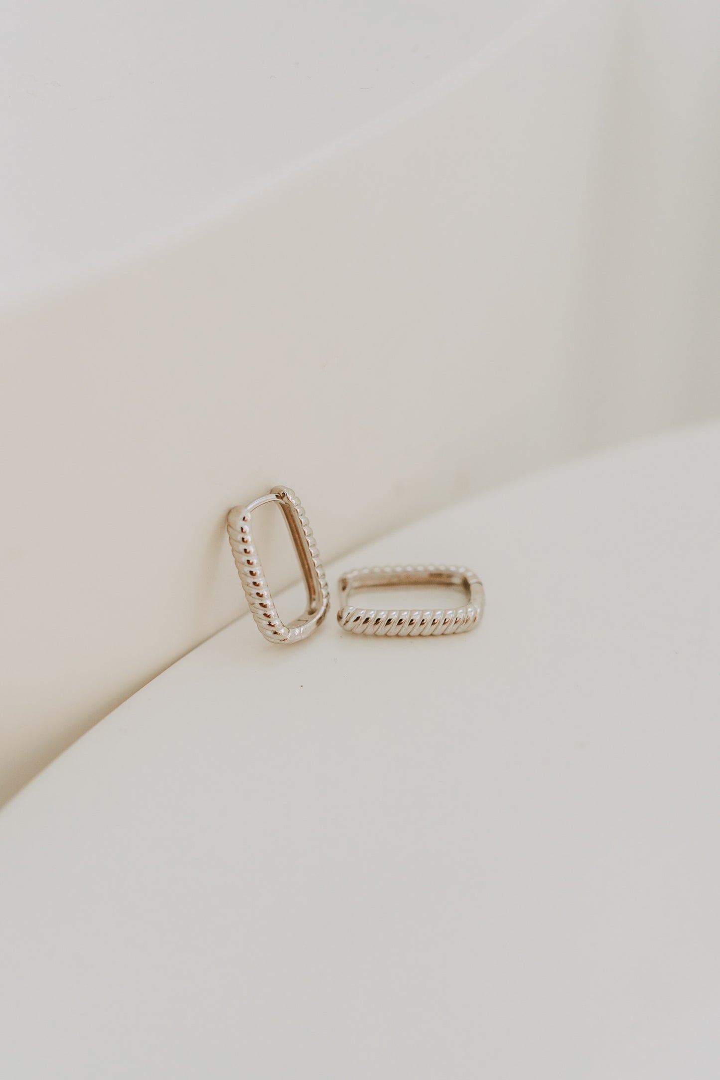 Lux - Silver Twist Huggie Hoops