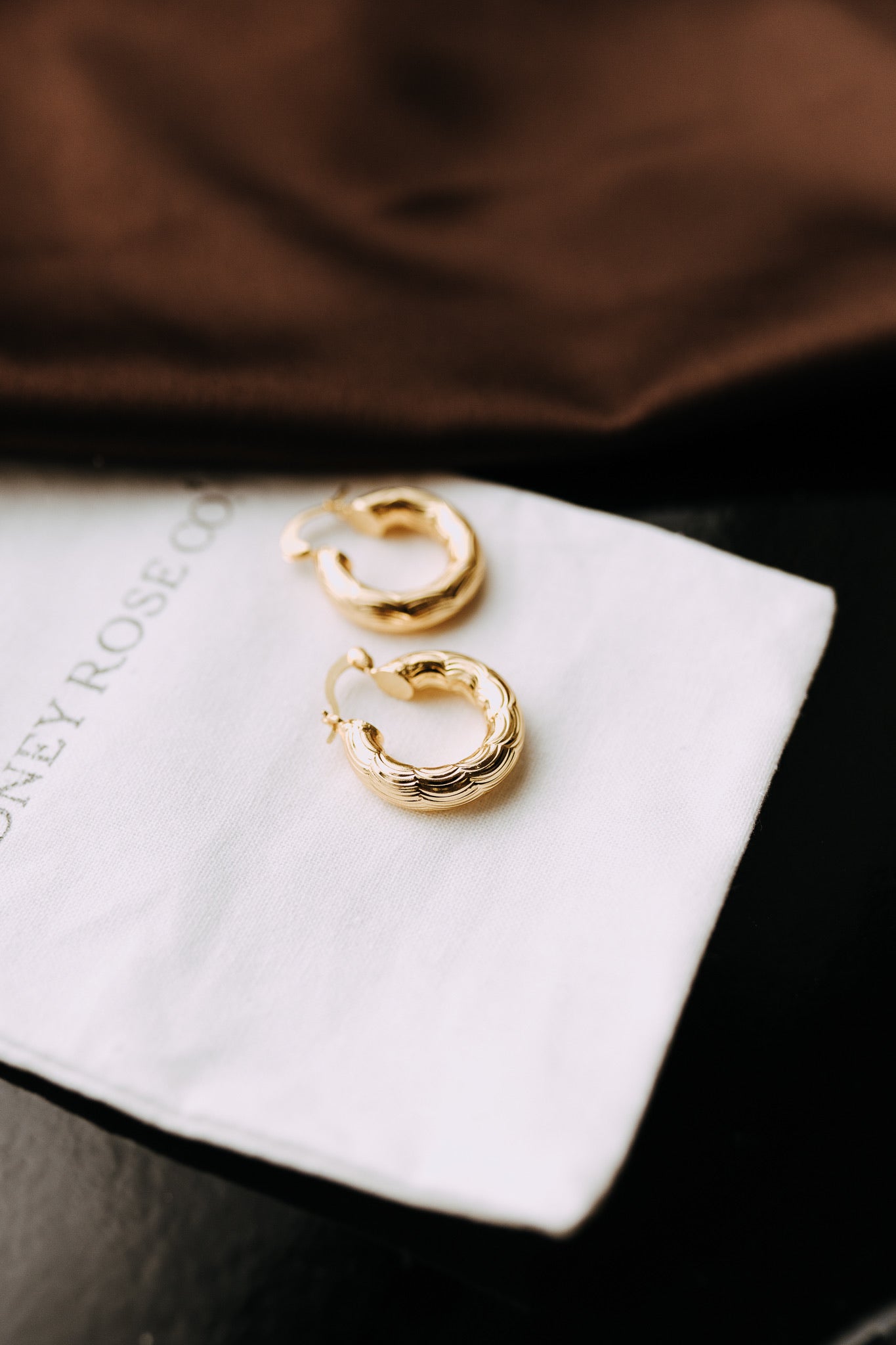 Pair of 22mm textured gold filled Camellia hoop earrings with hinged closure