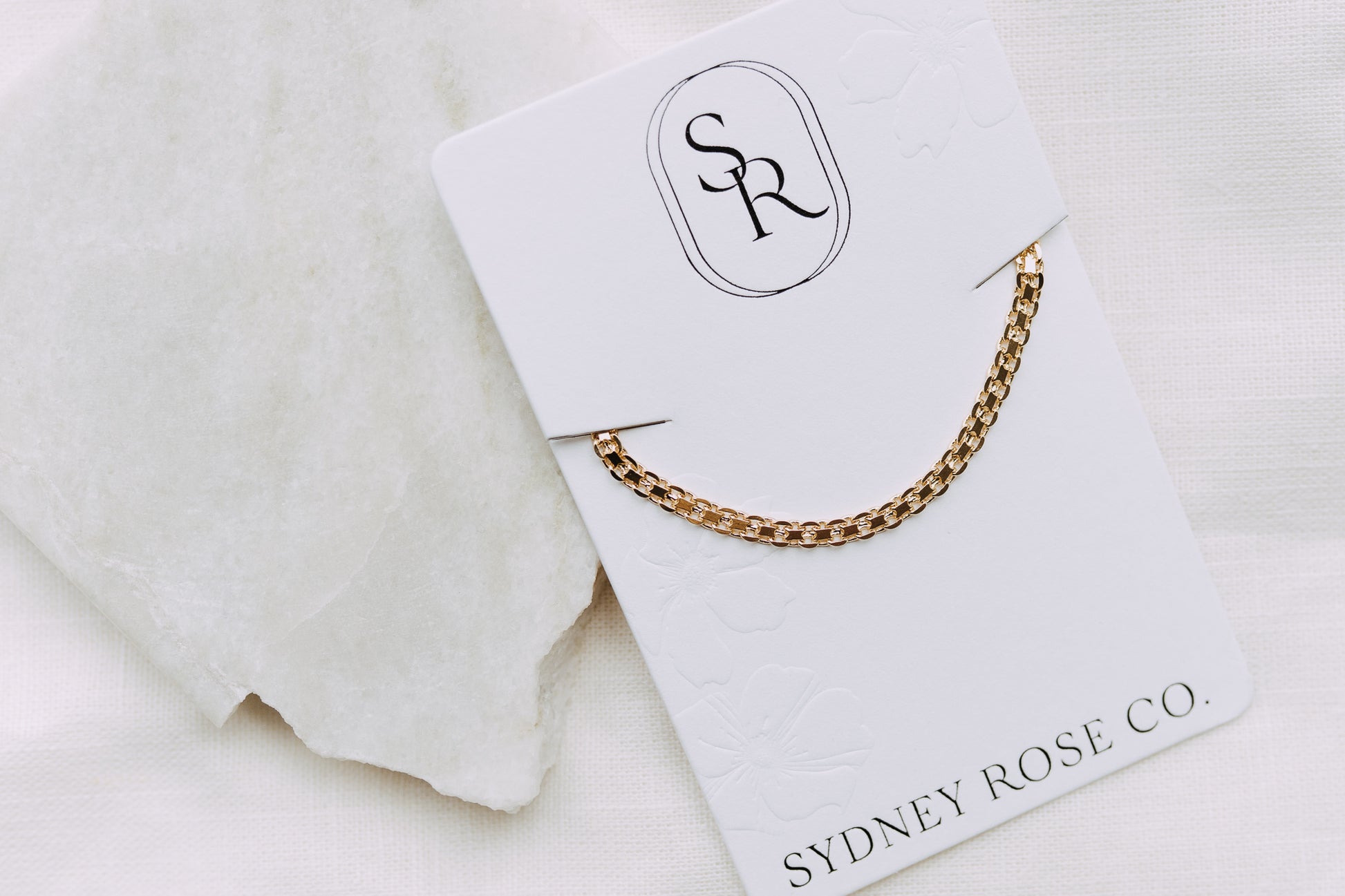 Marlow 3.5mm double curb bracelet displayed on Sydney Rose Co. jewelry card