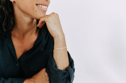 Minimalist sterling silver rope bracelet styled for everyday wear