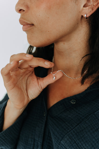 Sterling silver heart necklace with 6mm heart charm on a delicate paperclip chain