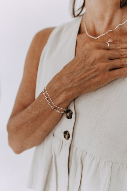 Everyday sterling silver bracelet featuring connected Figaro and Paperclip chains.