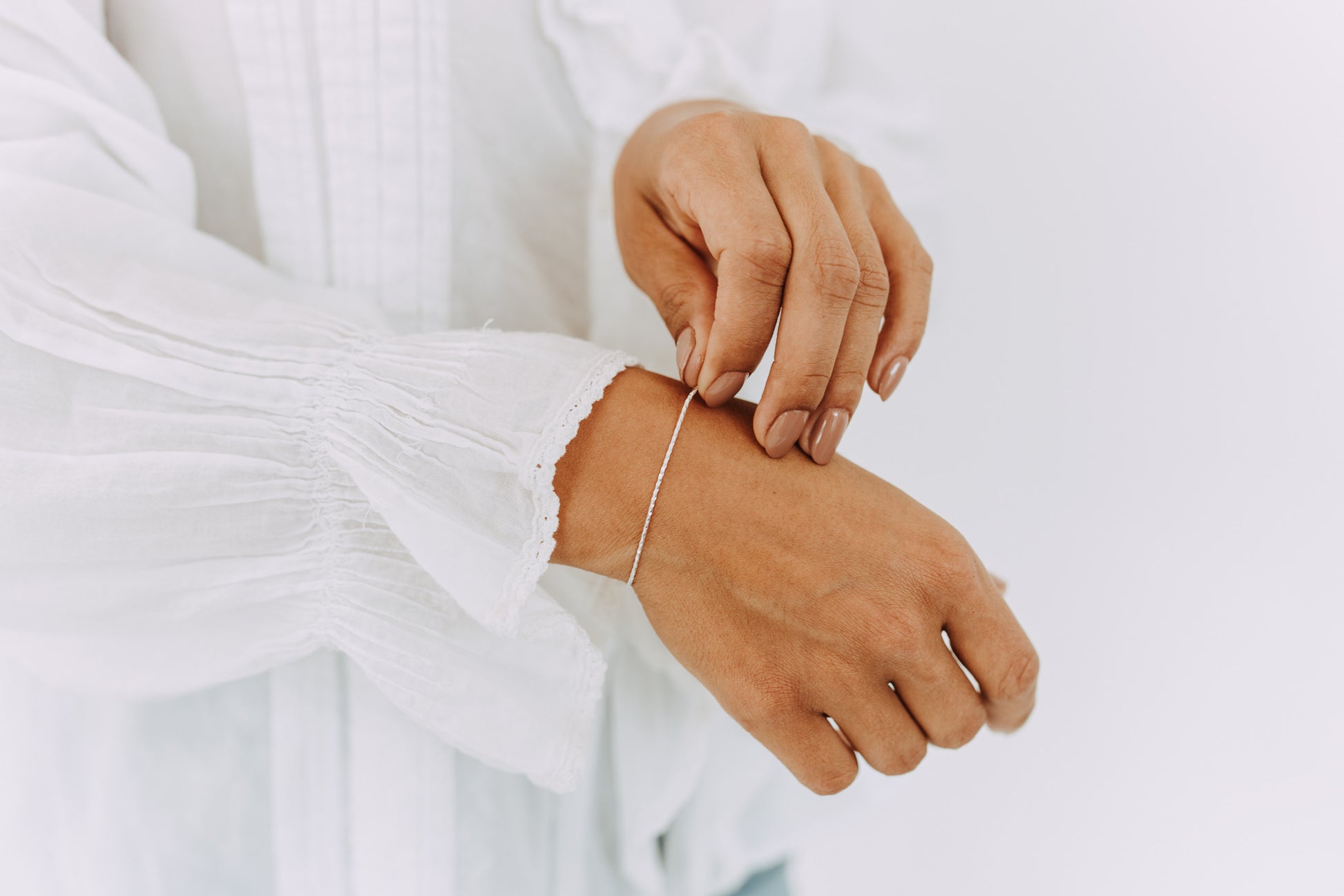 Adjustable Sterling Silver Shimmer Bracelet featuring a fine diamond-cut chain and polished finish.