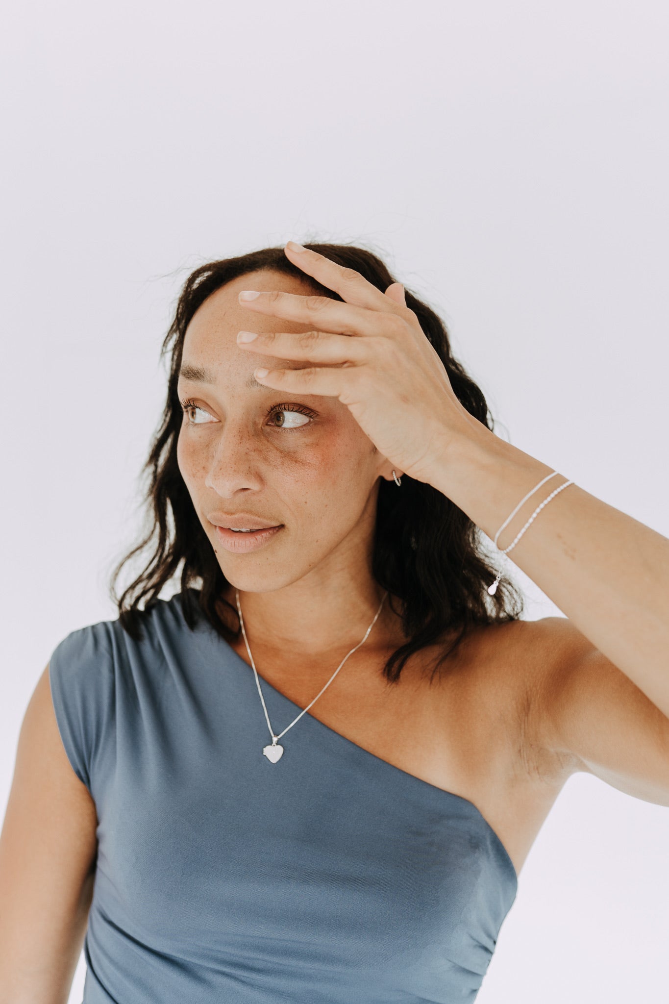 Minimalist sterling silver Coast Layer Bracelet styled for everyday wear.