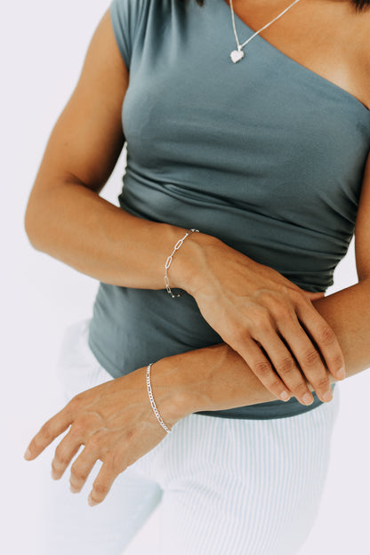 Sterling silver Figaro bracelet styled in a modern layered jewelry look.