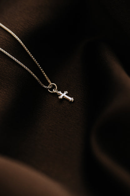 Lightweight sterling silver cross necklace close-up
