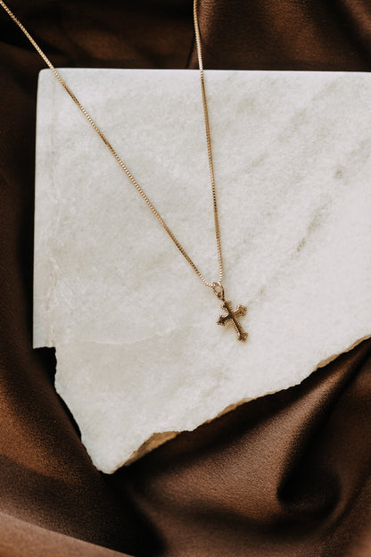 Waterproof gold cross necklace on box chain