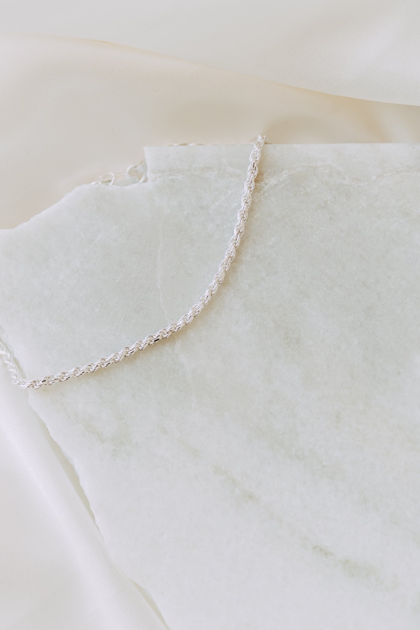 Close-up of men's .925 sterling silver rope chain bracelet