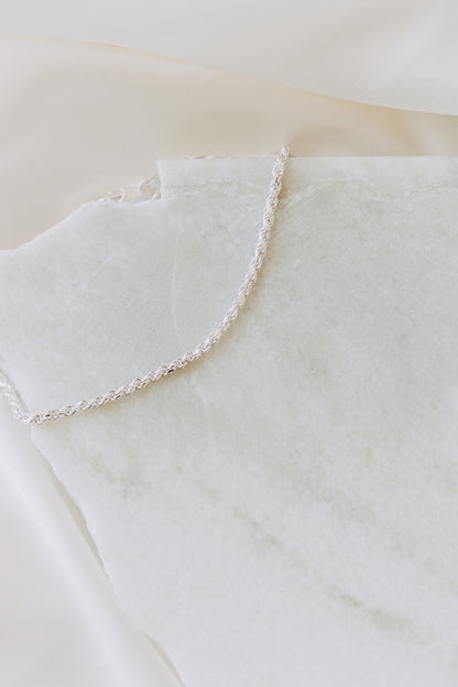 Close-up of men's .925 sterling silver rope chain bracelet