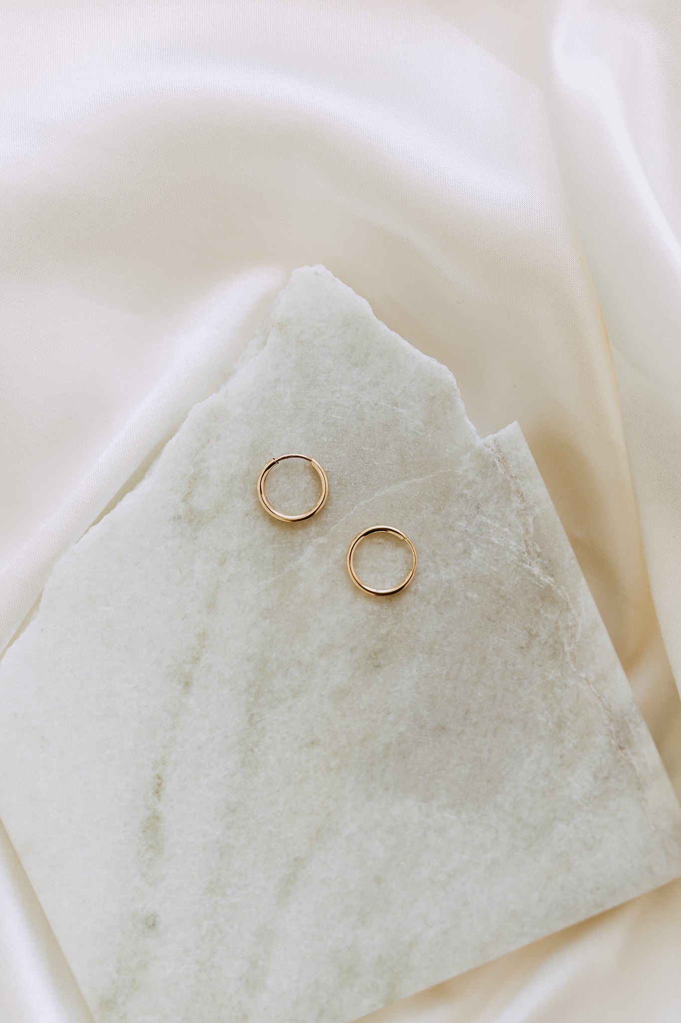 Classic men's gold hoop earrings with secure click closure