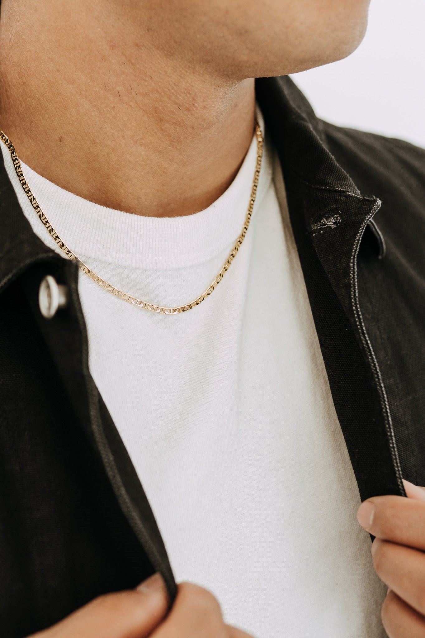 Close-up of sleek 3mm gold filled chain necklace for everyday men’s jewelry