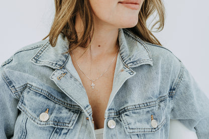Delicate sterling silver cross necklace with timeless styling