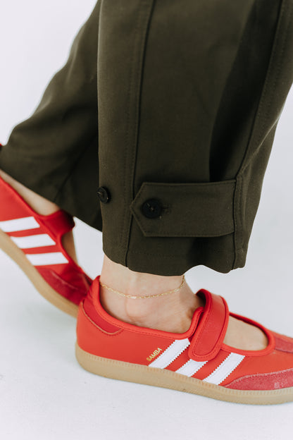 Delicate gold filled paperclip anklet layered with casual streetwear look
