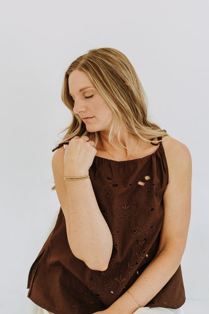 Classic gold filled bead bracelet worn alone for a simple elegant look