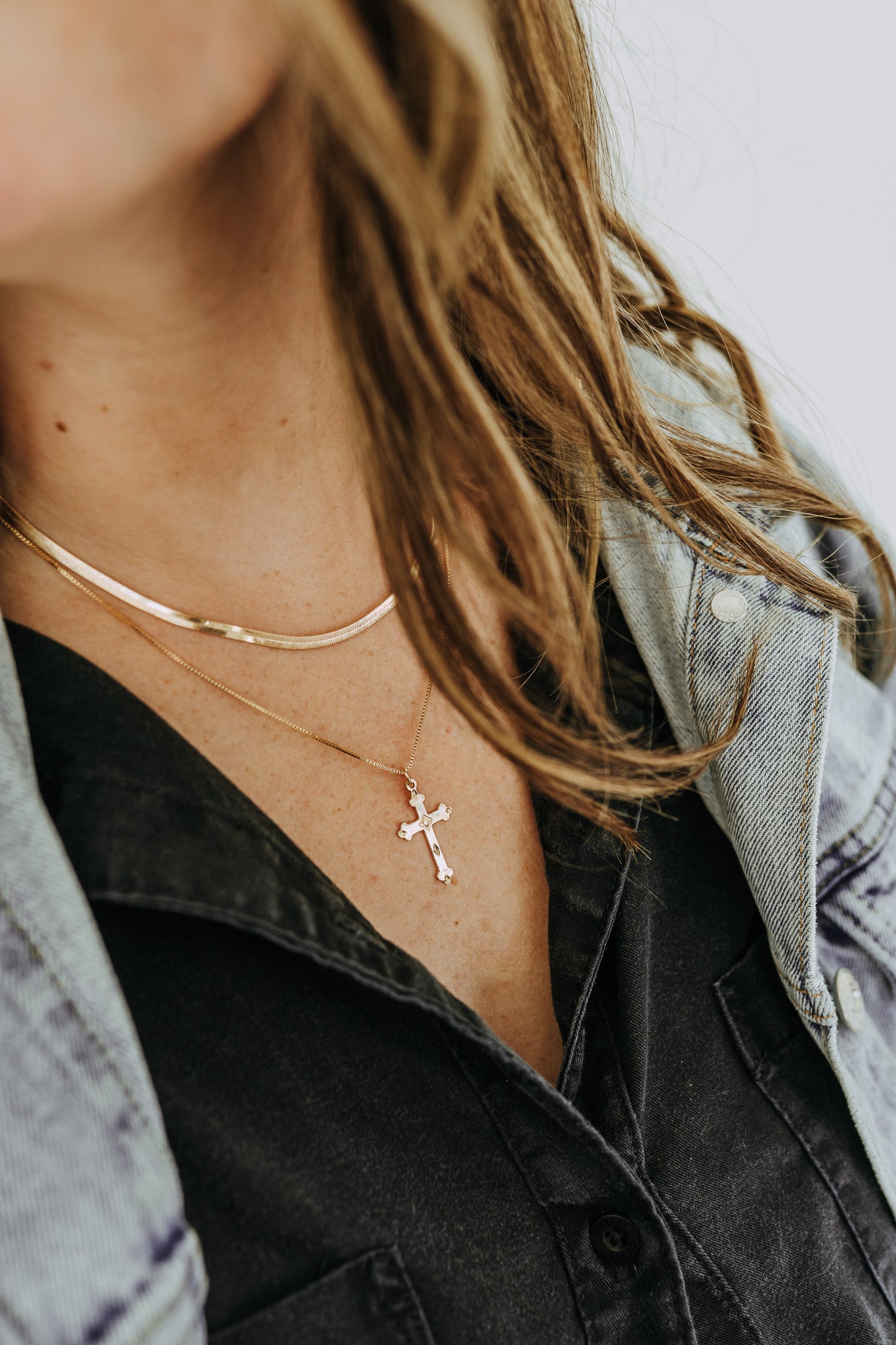 Statement gold cross necklace with vintage-inspired detailing