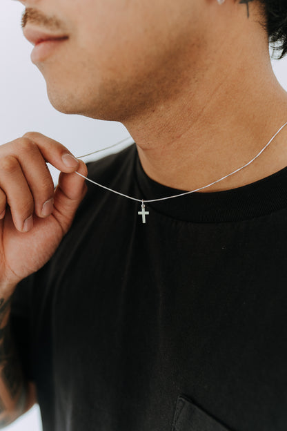 Everyday sterling silver cross necklace with lightweight minimalist design
